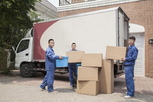 Removal van and moving boxes on a residential street in Lambeth