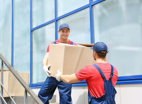 Moving van loading boxes from a Brixton property