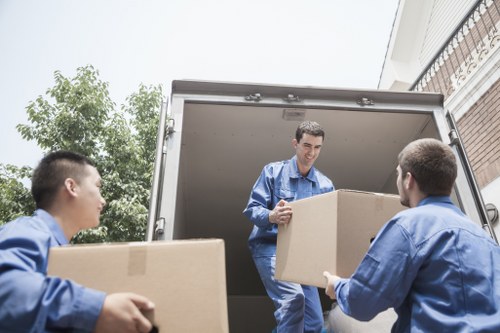 Office removal service preparing equipment for transport