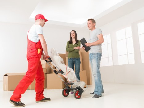 Removal crew following safe working practices during a property move