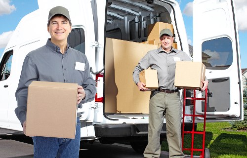 Packed boxes and furniture ready for transport in a Lambeth flat move