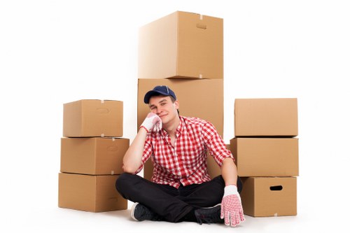 House removalists handling household furniture in Lambeth