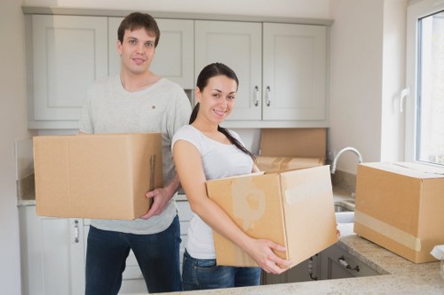 Professional movers handling a flat move with stairs in Lambeth